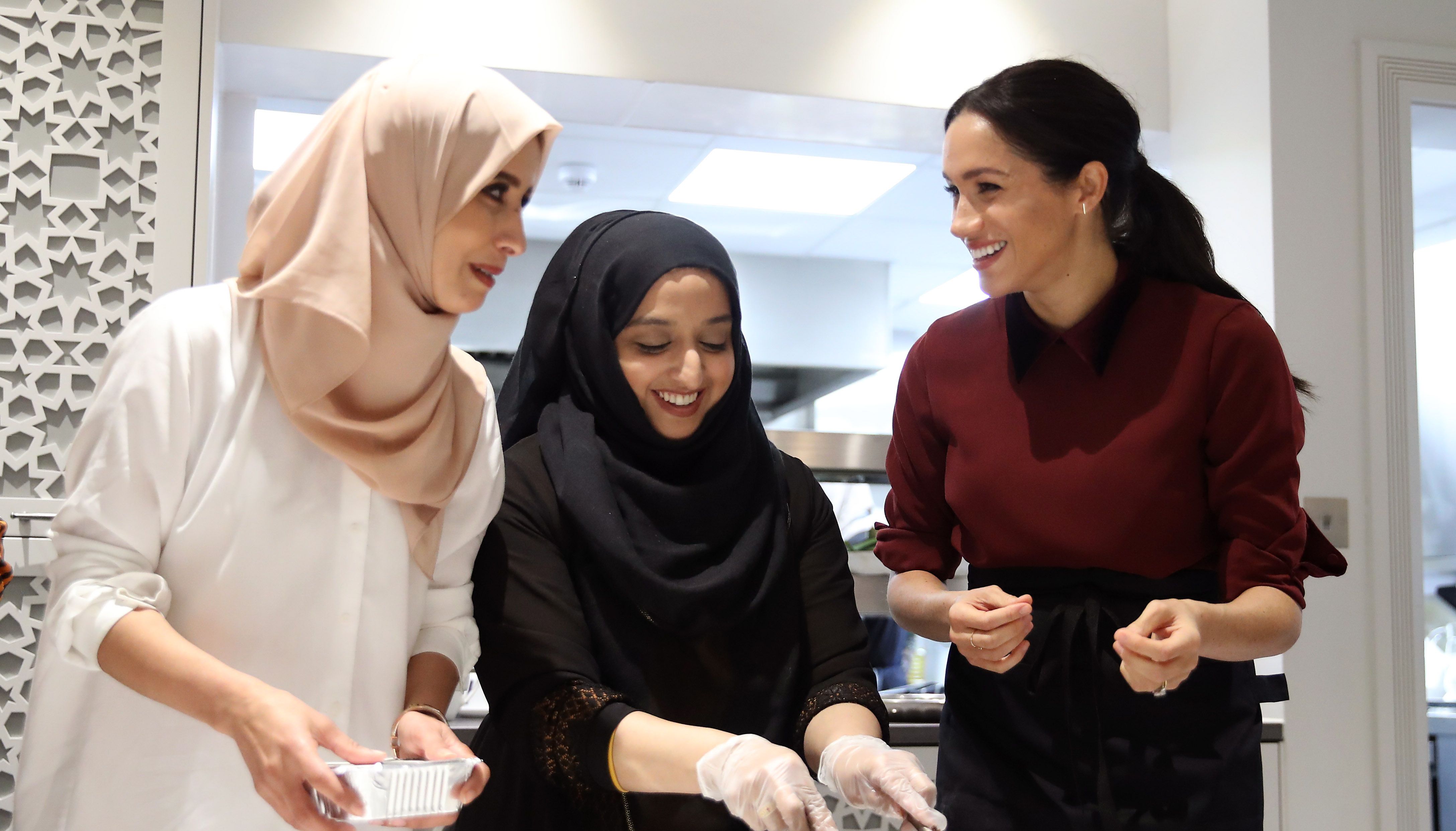 File photo dated 21/11/2018 of the Duchess of Sussex helps prepare food during her to visit the Hubb Community Kitchen, London. The Duchess called volunteers at the Grenfell community kitchen to mark the fifth anniversary of the tragedy. Issue date: Wednesday June 15, 2022.