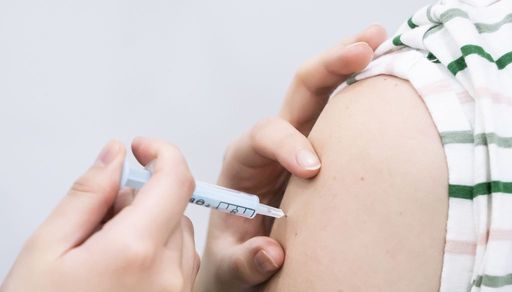 File photo dated 21/12/21 of a booster coronavirus vaccine being administered, as millions of people are being urged to have flu and Covid vaccines after experts said they were increasingly worried about a bad flu spike this winter.