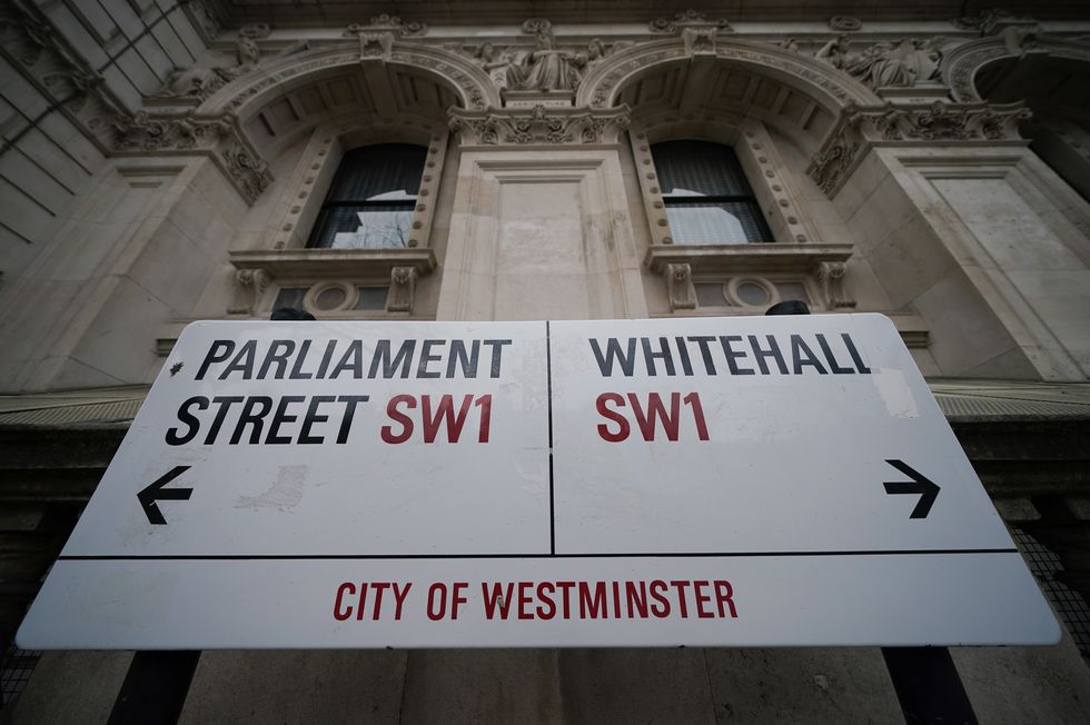 File photo dated 22/1/2022 of a street sign giving directions to Parliament Street and Whitehall in London. The Government has been accused of %22rank double standards%22 after giving almost 30 million in high-street vouchers to civil servants amid a pay freeze prompted by the cost-of-living crisis. Sixteen Whitehall departments in 2021-22 paid out a combined total of 29.57 million to staff in the form of 'reward and recognition' vouchers, a third more than in 2020-21 and two thirds more than in 2018-19, according to departmental data provided to Labour. Issue date: Thursday December 29, 2022.