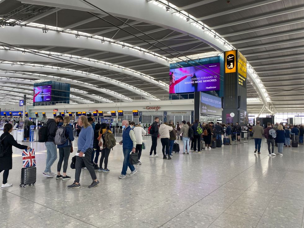 File photo dated 23/04/22 of passengers queuing to go through security in departures at Terminal 5 of Heathrow Airport, west London. Border Force officers at Heathrow have seized material contaminated with uranium, and counter-terrorism police are investigating. Issue date: Tuesday January 10, 2023.