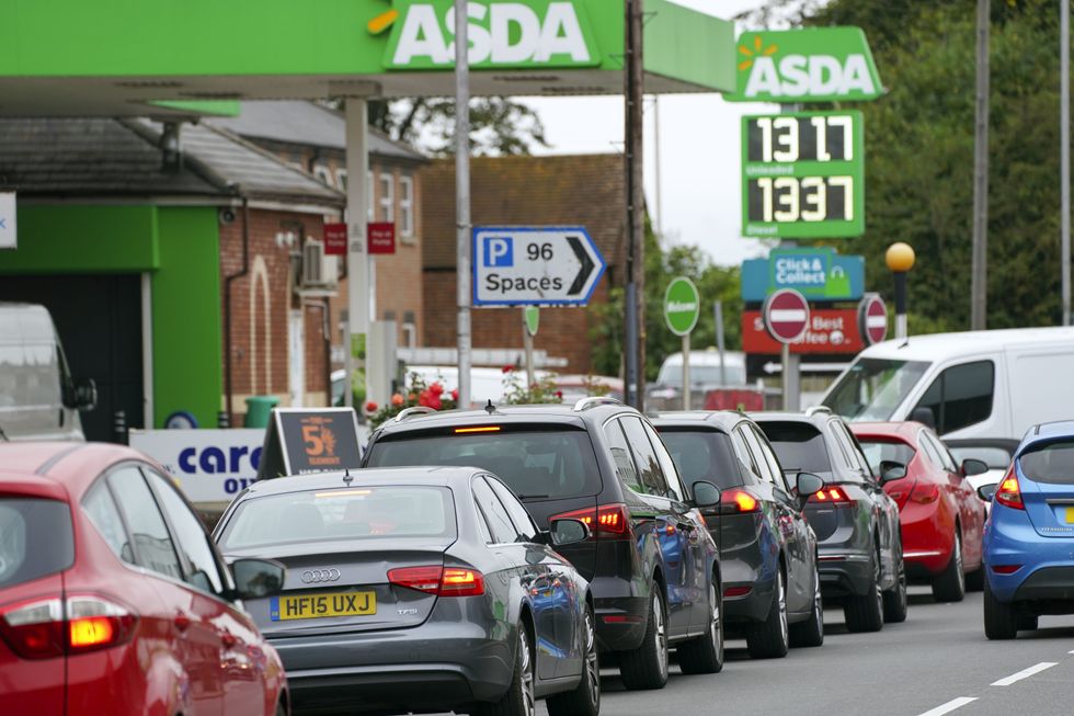 File photo dated 25/02/21 of cars queuing outside Asda petrol station in Reading, Berkshire, as The Co-operative Group has agreed to sell its 129-strong petrol forecourt chain to supermarket giant Asda in a deal worth around 600 million.