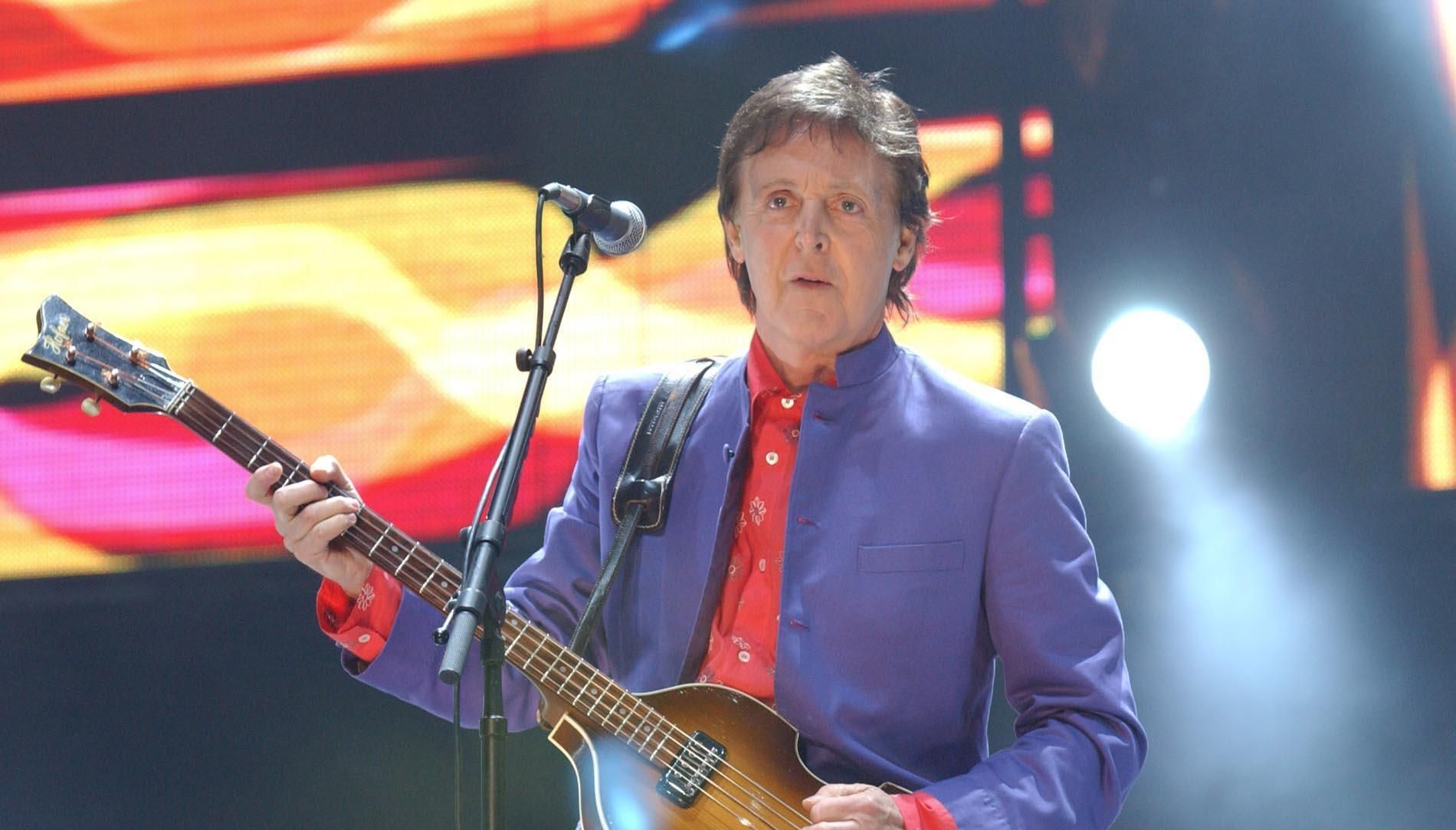 File photo dated 26/06/04 of Sir Paul McCartney who will become Glastonbury Festival's oldest ever solo headliner when he takes to the stage this weekend. Issue date: Monday June 20, 2022.