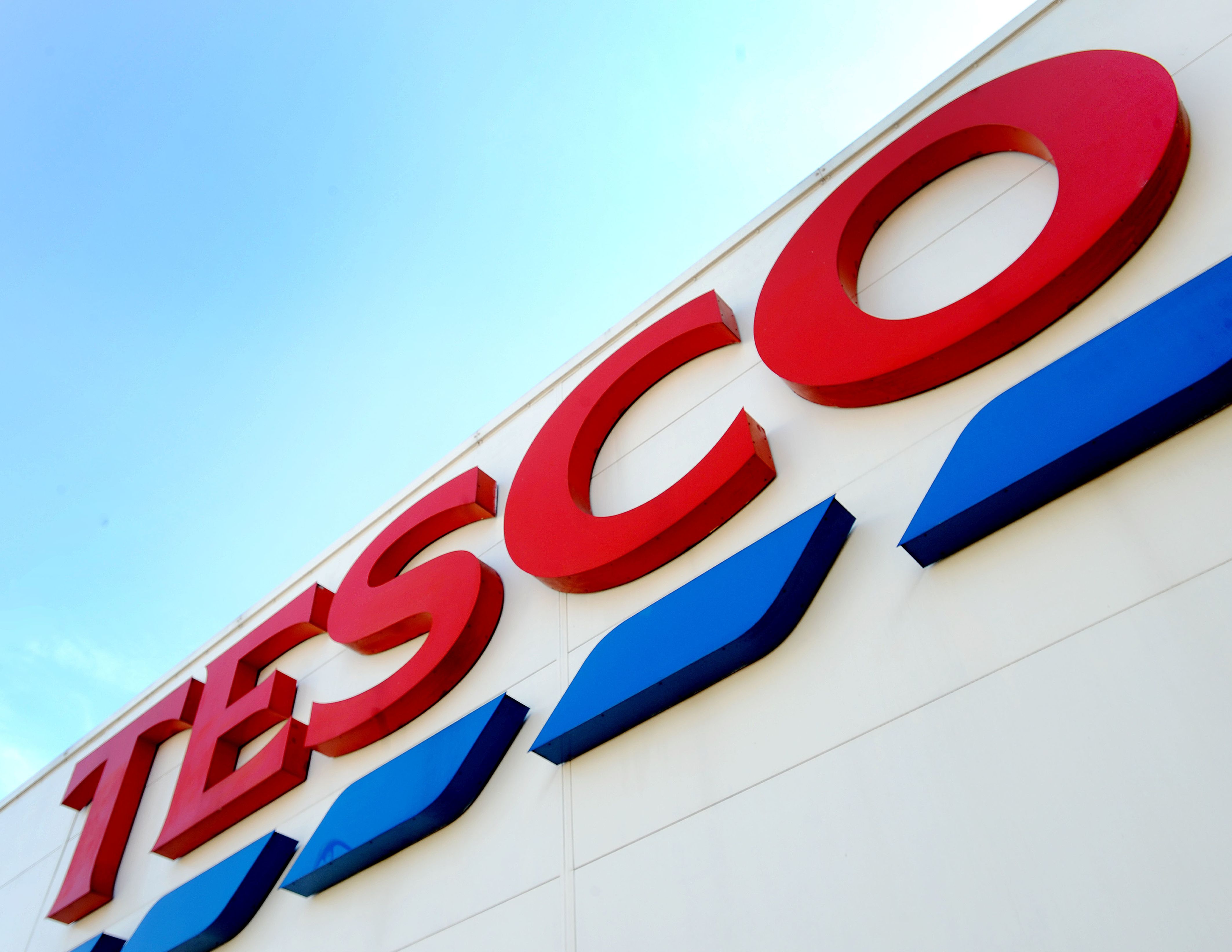 File photo dated 26/08/16 of a general view of a Tesco shop sign, as the supermarket giant said it will shake-up its shop management roles and shut remaining counters and hot delis in an overhaul which will impact around 2,100 jobs.