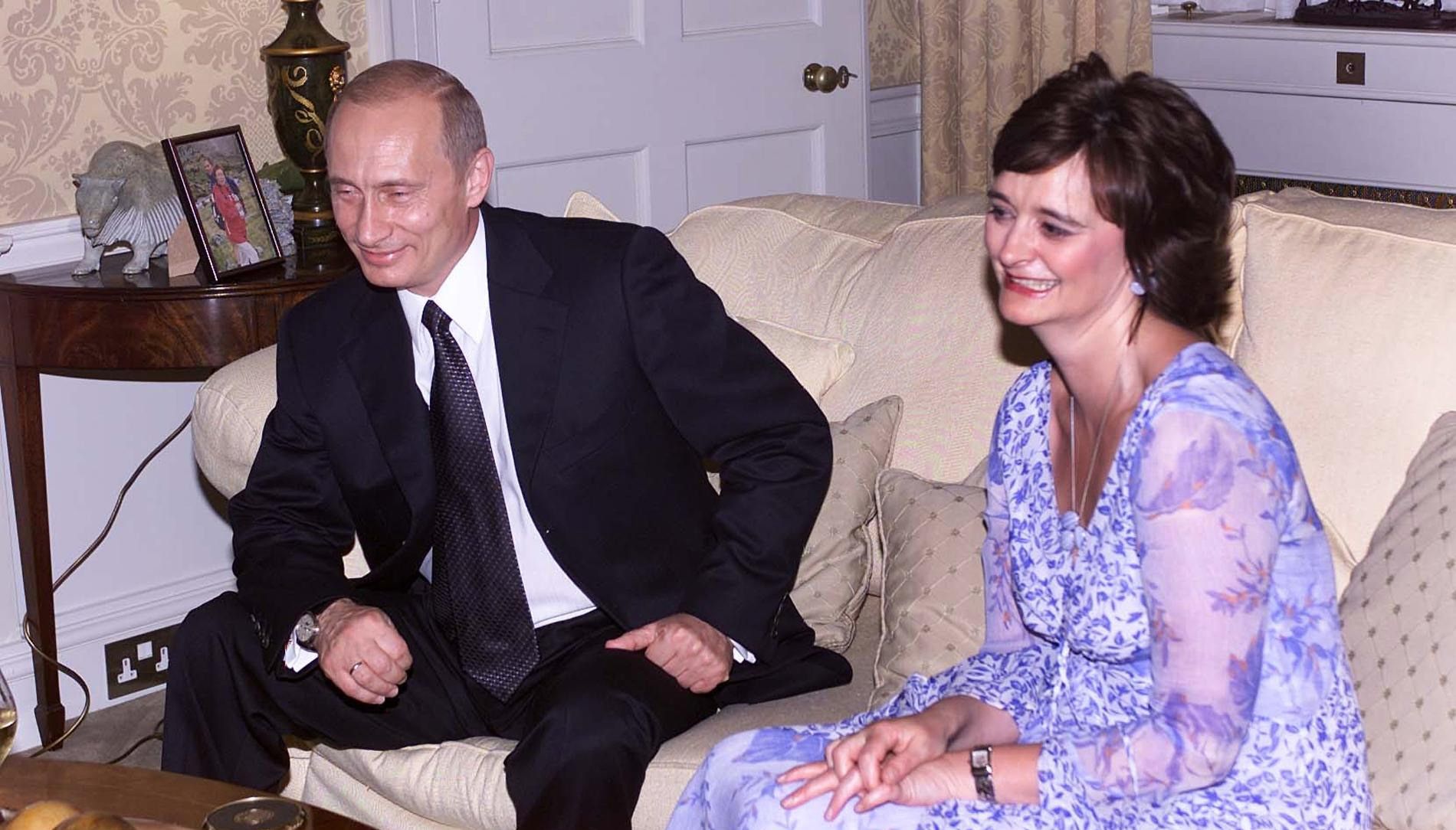 File photo dated 26/6/2003 of Russian President Vladimir Putin, sitting with Cherie Blair, the wife of the then British Prime Minister Tony Blair, in Downing Street, London, during his official state visit to Britain.