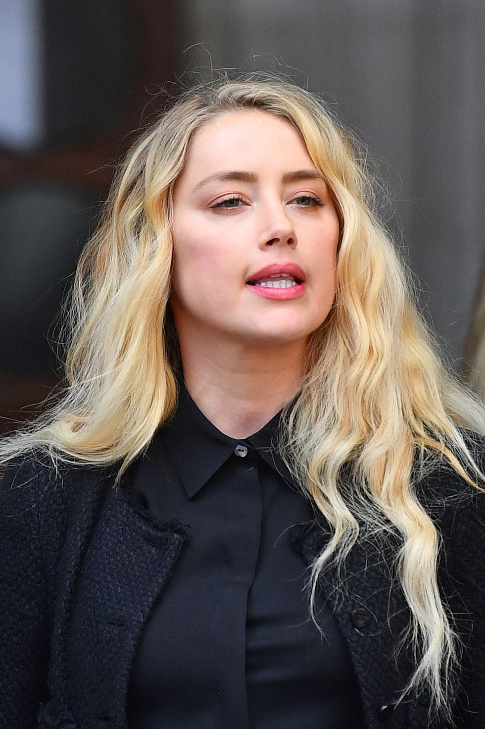 File photo dated 28/07/2020 of actress Amber Heard outside the High Court in London, as after six weeks of evidence and details of violent altercations between the pair, closing arguments are due in the US defamation trial between Johnny Depp and Amber Heard.