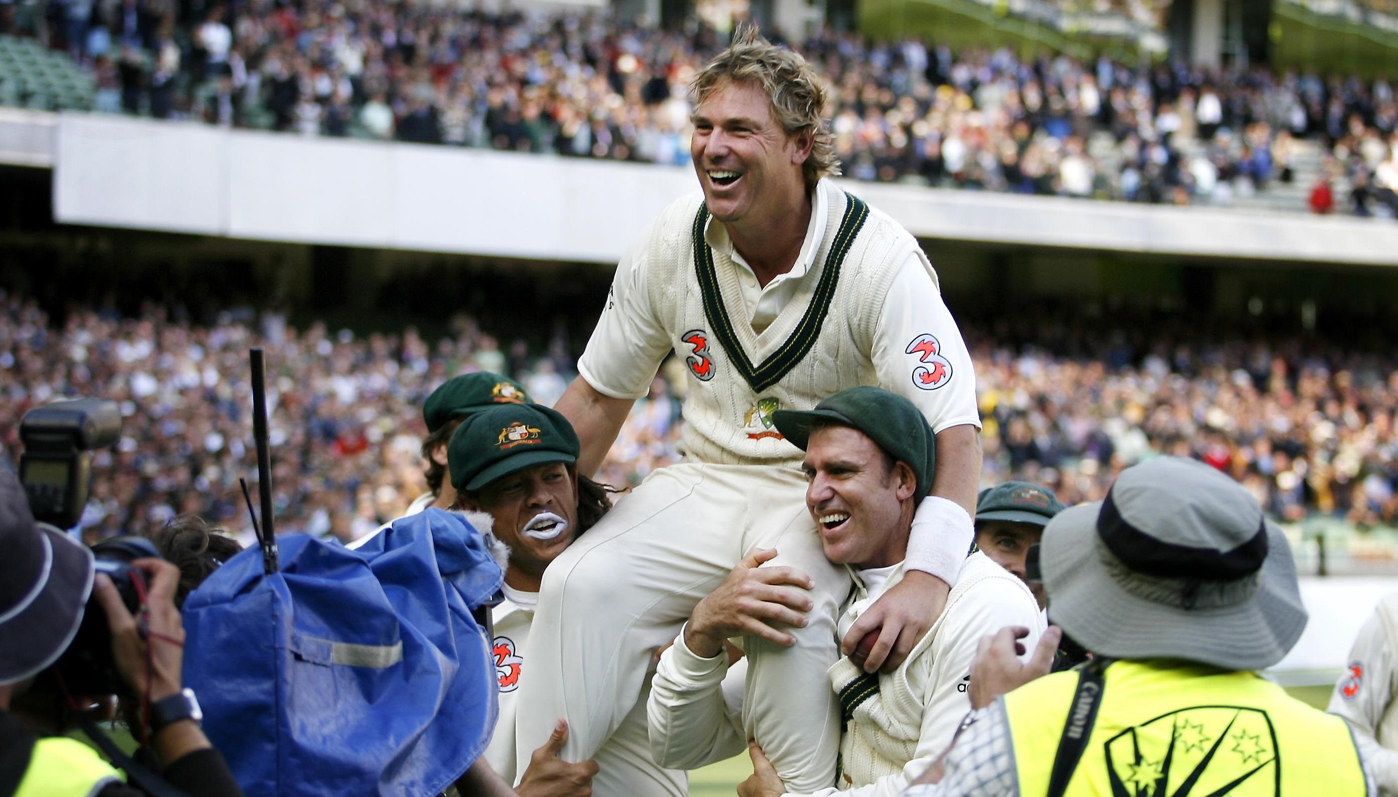 File photo dated 28-12-2006 of Australia's man-of-the-match Shane Warne is carried from the field by team-mates Andrew Symonds and Matthew Hayden after victory on the third day of the fourth Test match against England at the MCG in Melbourne, Australia. Former Australia cricketer Shane Warne has died at the age of 52, his management company MPC Entertainment has announced in a statement. Issue date: Friday March 4, 2022.