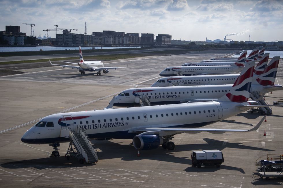 File photo dated 29/04/21 of a line of British Airways planes at London City Airport, as projects to turn household rubbish into fuel for %22guilt-free flying%22 on jets have been awarded a share of a 165 million fund.