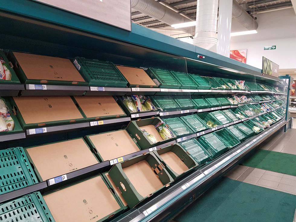 File photo dated 29/08/21 of empty shelves at Tesco Extra near Worthing, West Sussex. The boss of the Food and Drink Federation has said that the days when UK consumers could expect to pick up nearly whatever product they want whenever they want from supermarket shelves are over. Ian Wright, the body's chief executive, said that a shortage of lorry drivers is in part due to them moving to online retailers and starting to deliver for Amazon and Tesco. Issue date: Friday September 10, 2021.