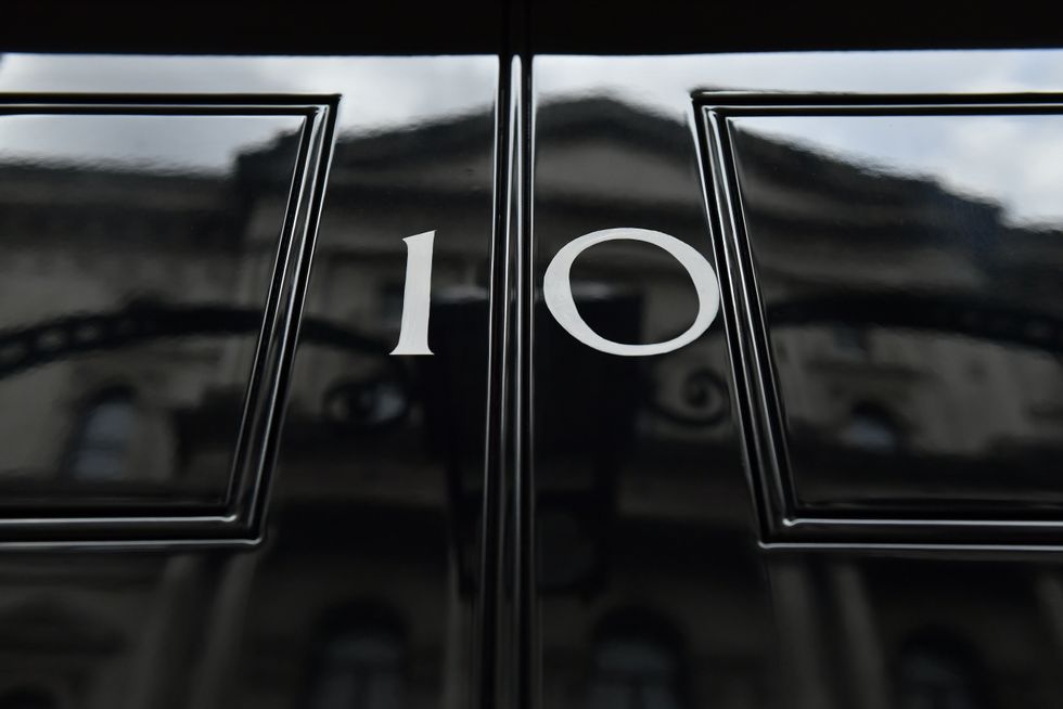 File photo dated 29/10/2019 of the front door of number 10 Downing Street in London. People who attended alleged lockdown-breaking parties at Downing Street and the Cabinet Office are reportedly braced for an initial tranche of fines from the Metropolitan Police. The Guardian has suggested the fixed penalty notices (FPNs) will be issued %22imminently%22, while other outlets have reported they are due to surface soon. The force is investigating 12 events, including as many as six Prime Minister Boris Johnson is said to have attended. Issue date: Tuesday March 29, 2022.