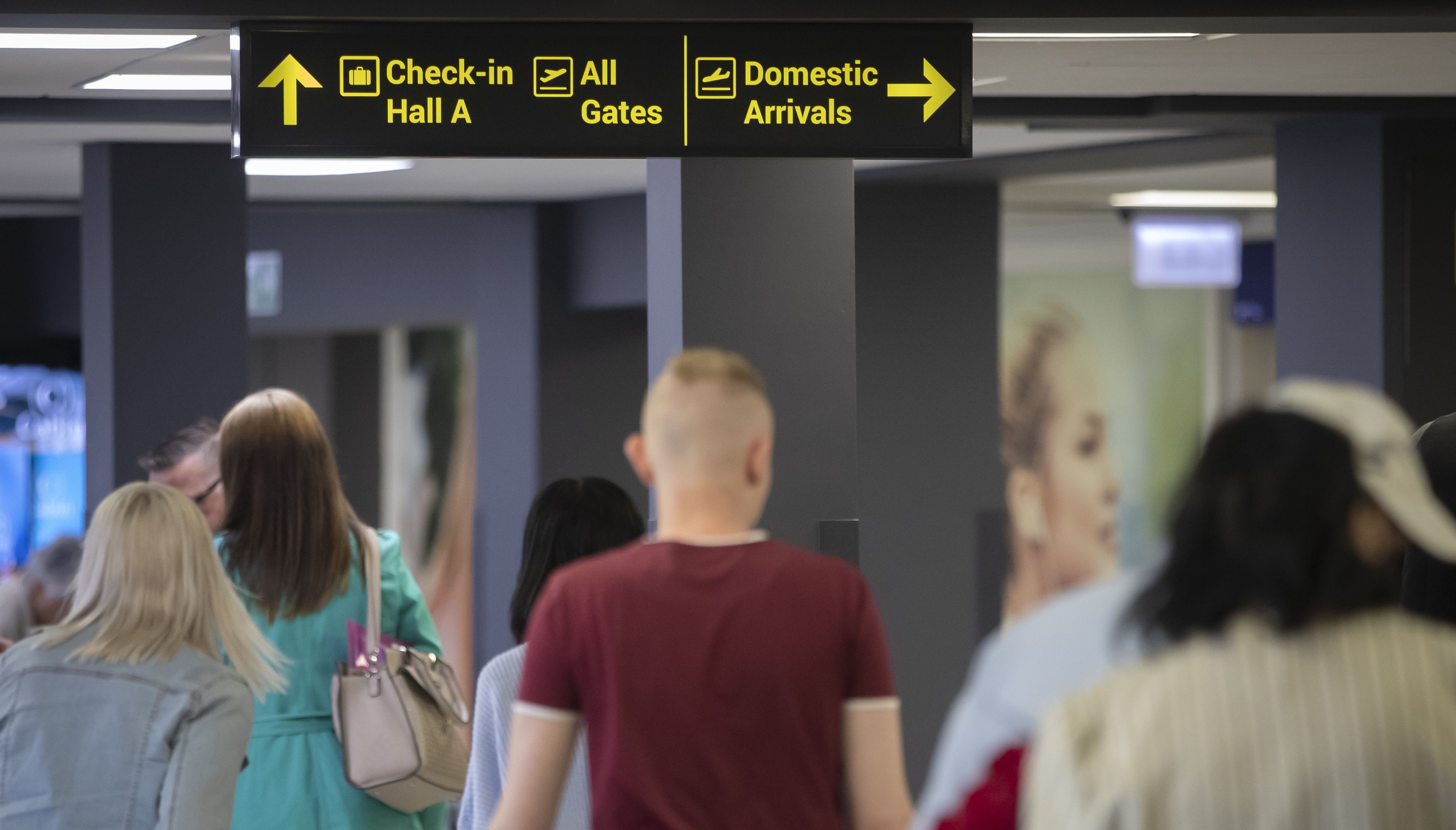 File photo dated 31/05/19 of passengers at Leeds Bradford Airport, as rules around taking liquids and laptops through airport security will be eased from June 2024, the Government has announced.