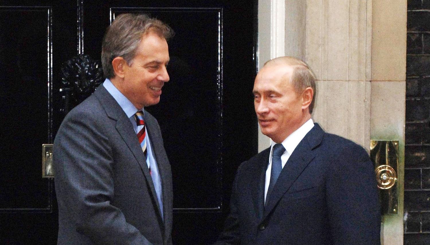 File photo dated 5/1/2005 of Russia's President Vladimir Putin being greeted by Tony Blair - British Prime Minister at the time - as he arrives at 10 Downing Street.