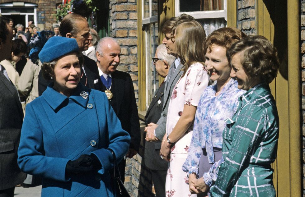 File photo dated 5/5/1982 of Queen Elizabeth II and Prince Philip visiting the newly built location of Granada Television's %22Coronation Street%22 in Manchester, where they met some of the cast from left to right: Jack Howarth, William Roache, Anne Kirkbride, Eileen Derbyshire and Thelma Barlow. Issue date: Thursday September 8, 2022. The monarch was not fazed by celebrities and encountered hundreds of showbiz stars, pop legends and Hollywood greats over the decades, but many admitted to nerves on coming face to face with the famous long-reigning sovereign.