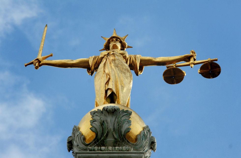 File photo dated 6/3/2007 of the statue of "Lady Justice" by the British sculptor, Frederick William Pomeroy, which stands on the dome of the Central Criminal Court also referred to as the Old Bailey.