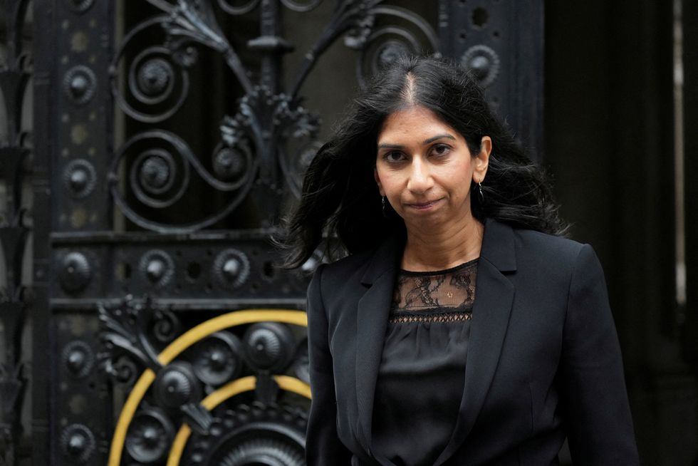 FILE PHOTO: Home secretary Suella Braverman QC walks outside 10 Downing Street, following the passing of Britain's Queen Elizabeth, in London, Britain, September 9, 2022. REUTERS/Maja Smiejkowska/File Photo