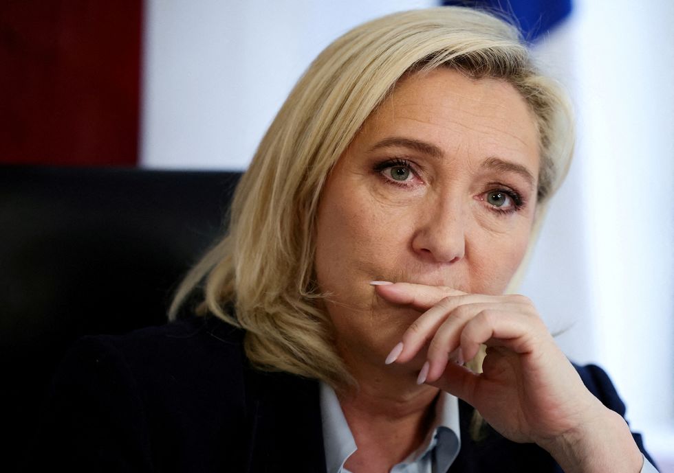 FILE PHOTO: Marine Le Pen, leader of French far-right National Rally (Rassemblement National) party and candidate for the 2022 French presidential election, attends an interview with Reuters at her campaign headquarters in Paris, France, March 29, 2022. REUTERS/Sarah Meyssonnier/File Photo