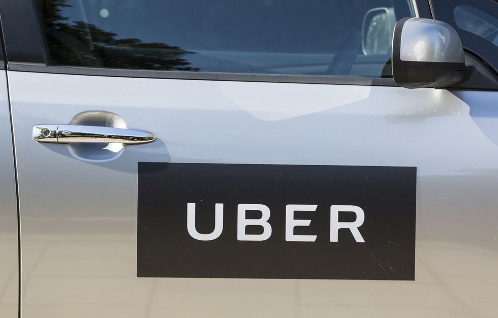 File photo of the logo of Uber on a car door