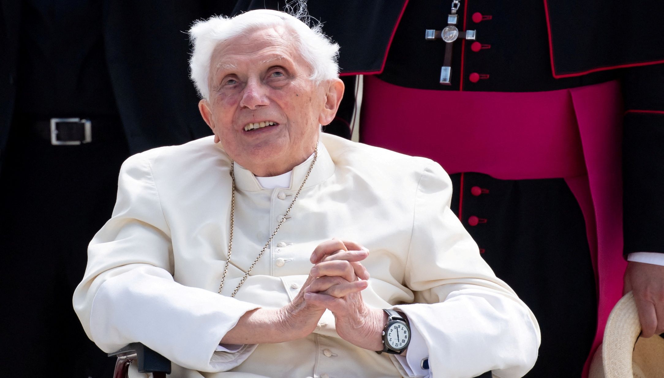 FILE PHOTO: Pope Emeritus Benedict XVI gestures at the Munich Airport before his departure to Rome, June 22, 2020. Former Pope Benedict traveled to his native Germany last week to visit his ailing older brother. Sven Hoppe/Pool via REUTERS/File Photo