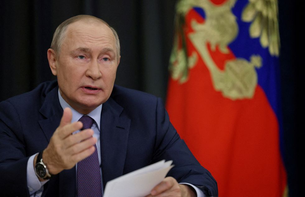 FILE PHOTO: Russian President Vladimir Putin chairs a meeting via video link in Sochi, Russia September 27, 2022. Sputnik/Gavriil Grigorov/Pool via REUTERS ATTENTION EDITORS - THIS IMAGE WAS PROVIDED BY A THIRD PARTY./File Photo