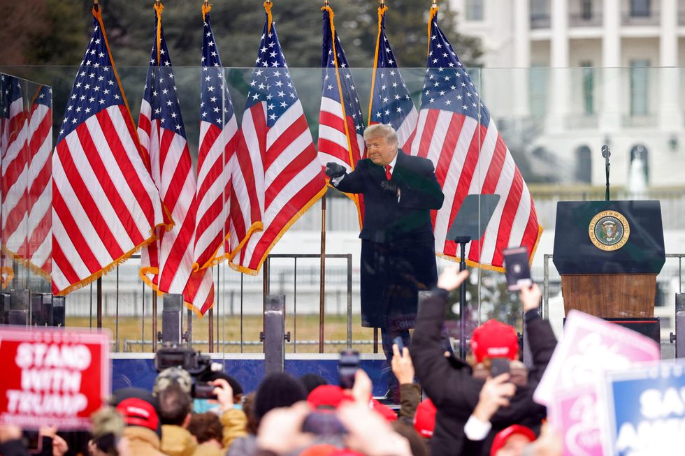 FILE PHOTO: U.S. President Donald Trump gestures at the end of his speech during a rally to contest the certification of the 2020 U.S. presidential election results by the U.S. Congress, in Washington, U.S, January 6, 2021. REUTERS/Jim Bourg/File Photo