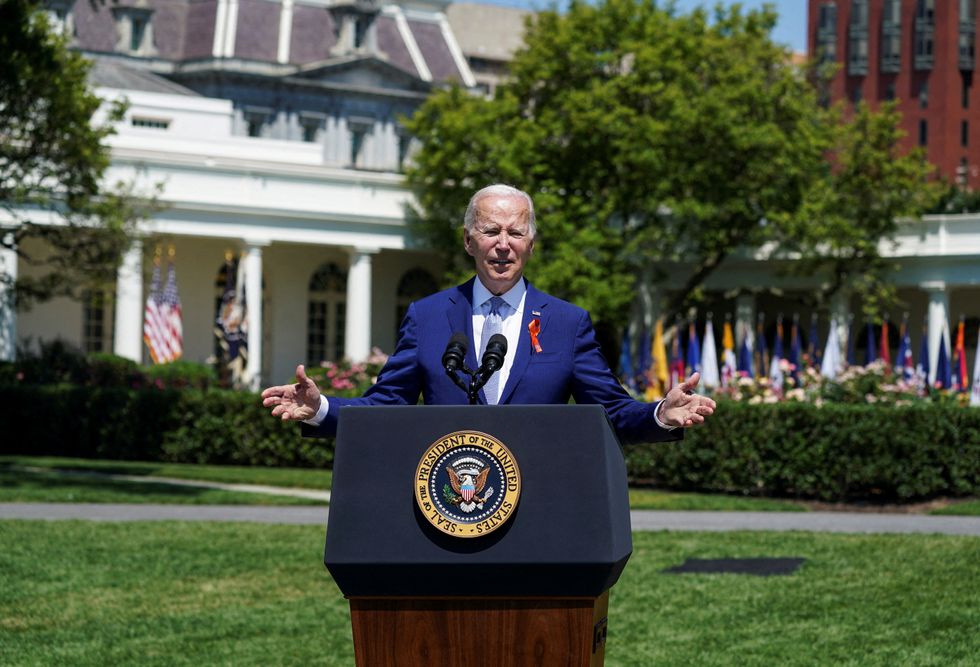 FILE PHOTO: U.S. President Joe Biden speaks during an event to celebrate passage of the %22Safer Communities Act,%22 on the South Lawn at the White House in Washington, U.S., July 11, 2022. REUTERS/Kevin Lamarque/File Photo
