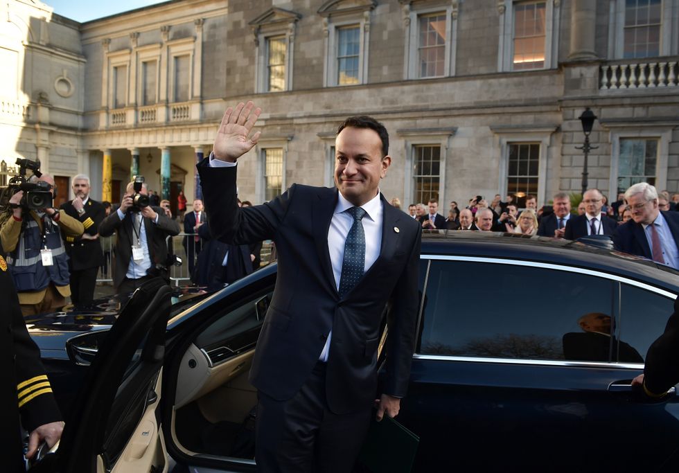 Fine Gael leader Leo Varadkar waves as he is congratulated by party members after being nominated as Taoiseach at Leinster House