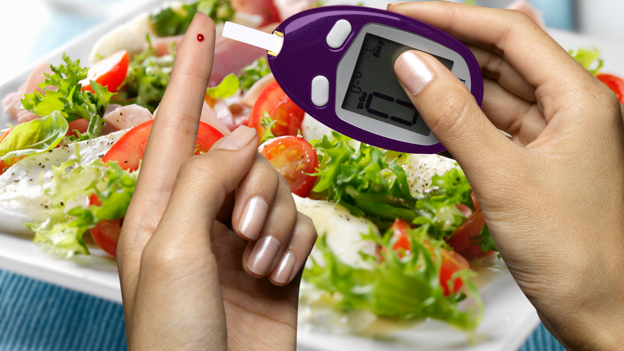 Finger prick diabetes test and a salad