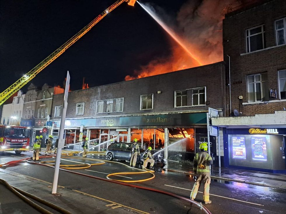 Penge fire: 100 firefighters rush to major blaze as entire high street shop goes up in flames