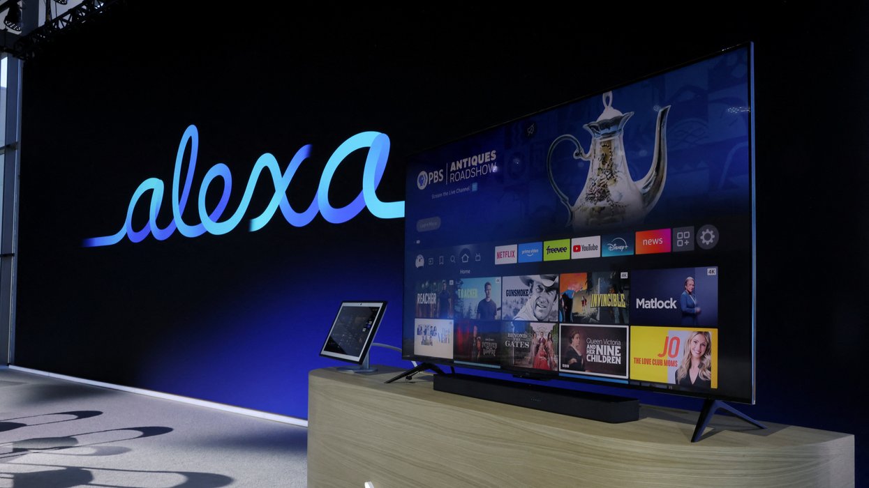 fire tv and echo show on-stage at the amazon event with the alexa logo in the background