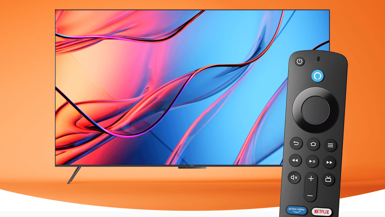 fire tv omni mini-led television pictured on an orange background with an alexa voice remote in the foreground