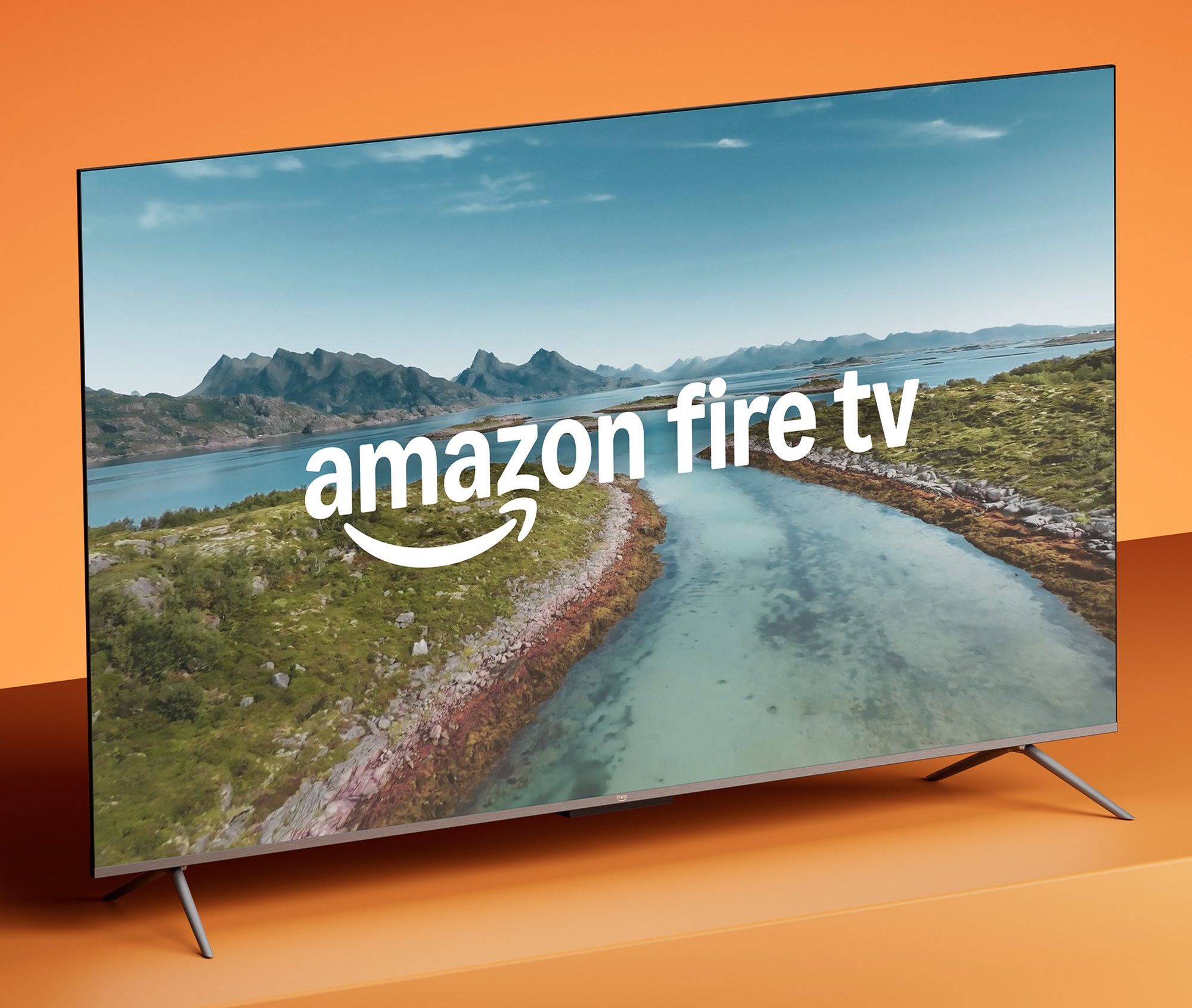 fire tv omni qled series on an orange background viewed from the side