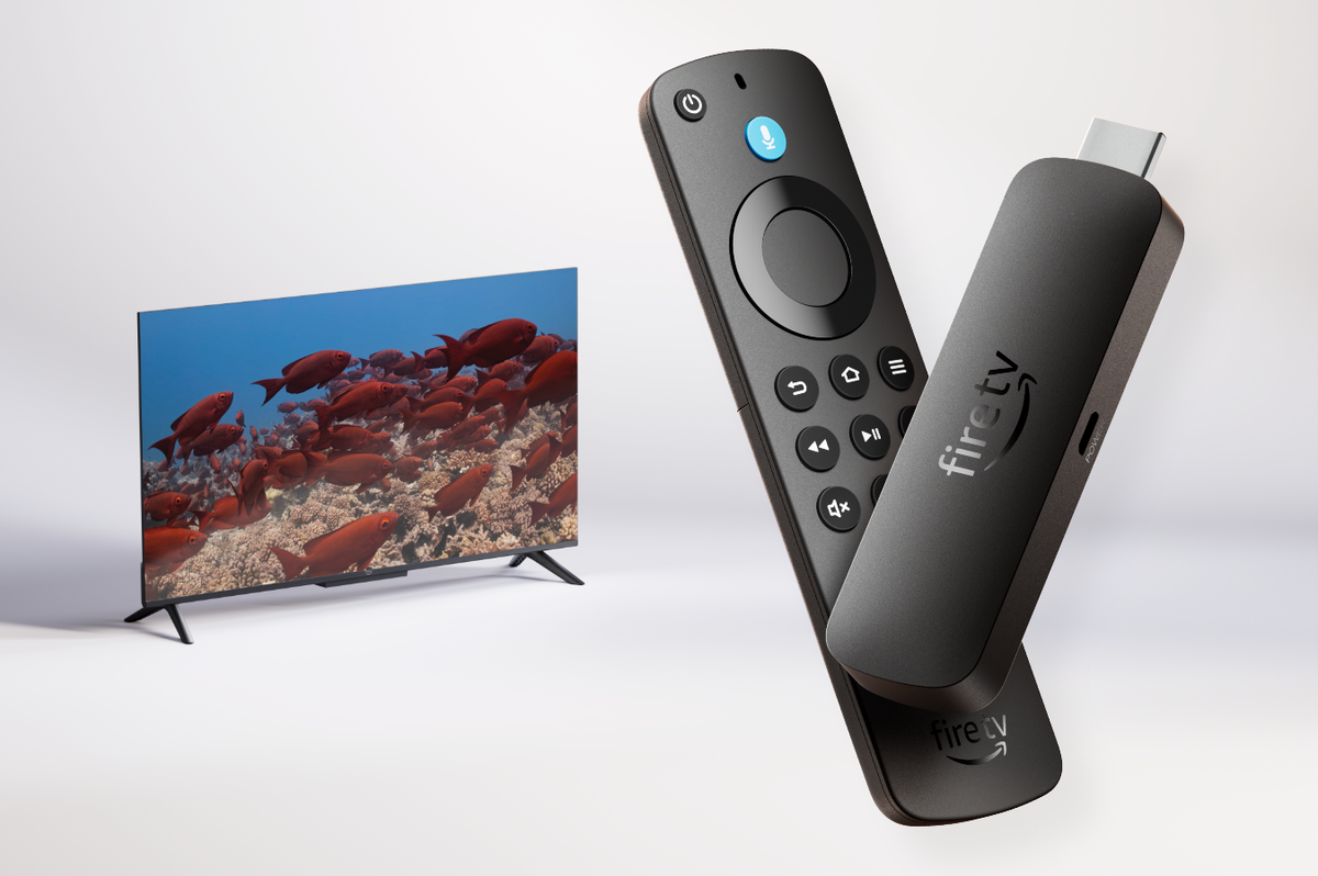 Fire TV Stick 4K Select with a television in the background