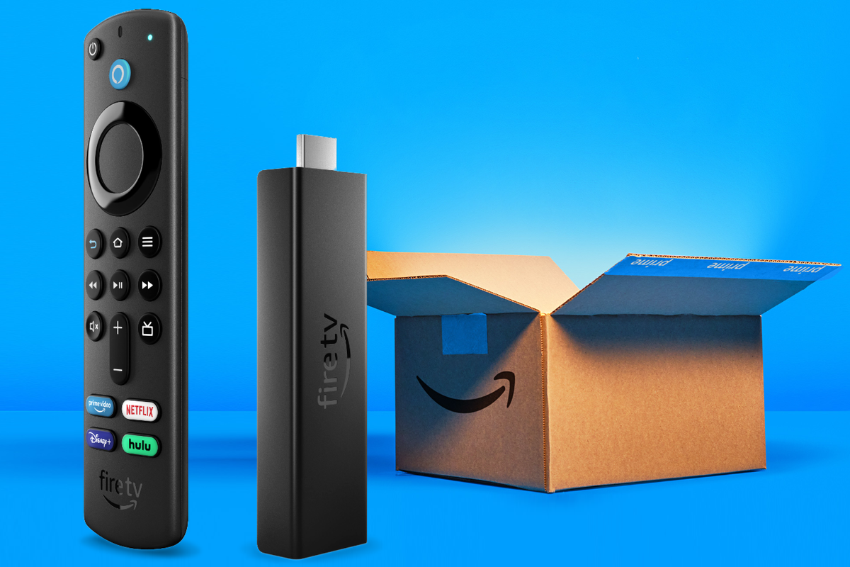 fire tv stick 4k with an amazon shipping box in the background