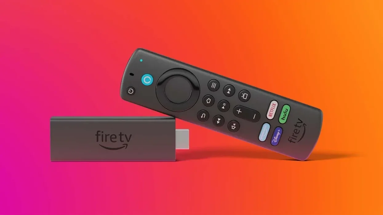 Fire TV Stick pictured on its side with the dongle and a multicolour background