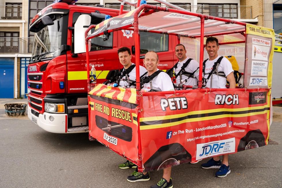 Firefighter Richard Green who will be running the London Marathon inside a mini fire engine