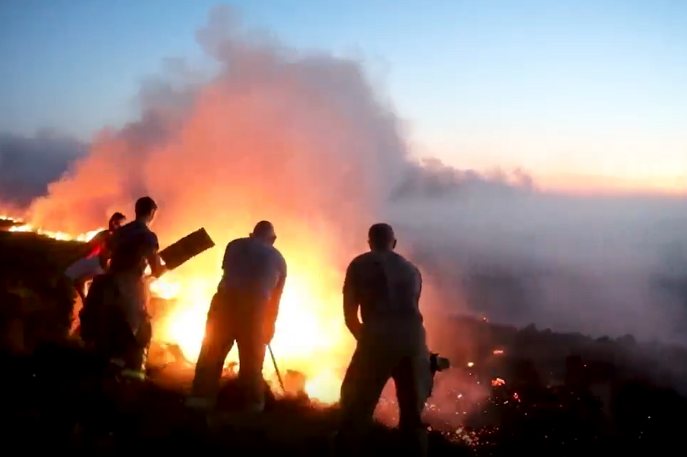 Firefighters battling wildfires