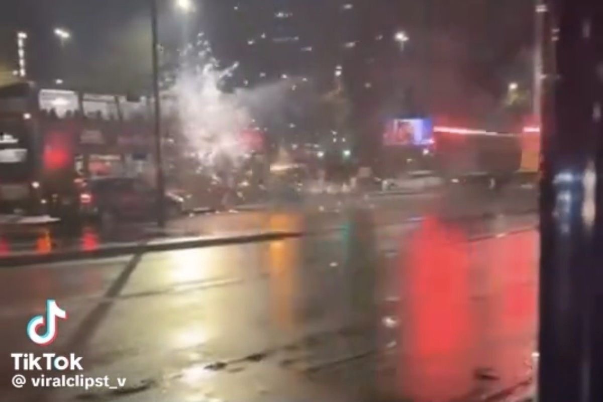 Fireworks being shot towards a bus in Birmingham
