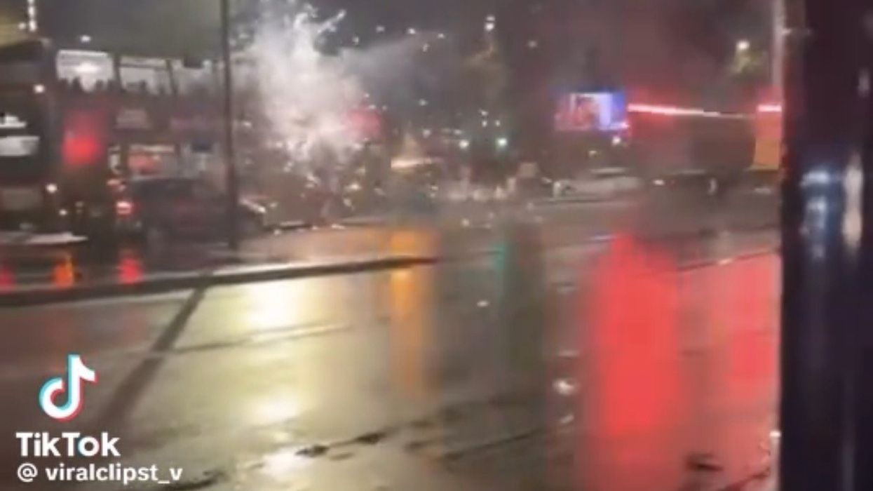 Fireworks being shot towards a bus in Birmingham