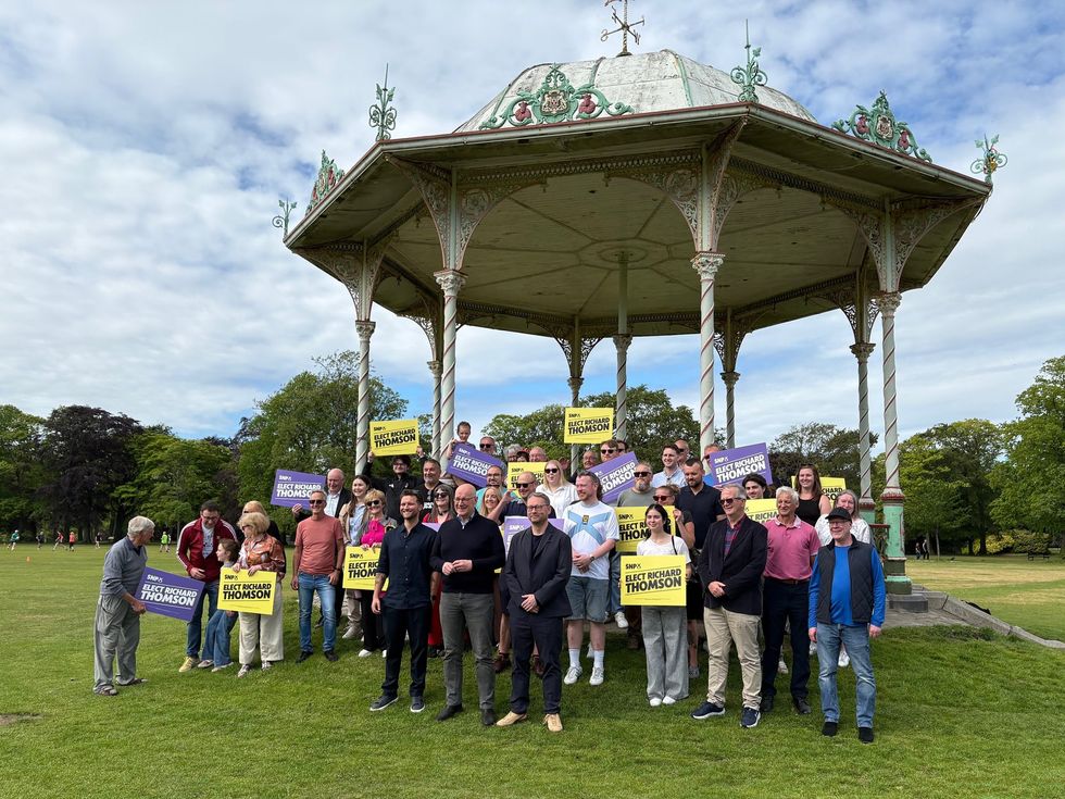 First Minister John Swinney with Richard Thomson (right, front row) SNP candidate for the Aberdeen South by election and Jack Middleton