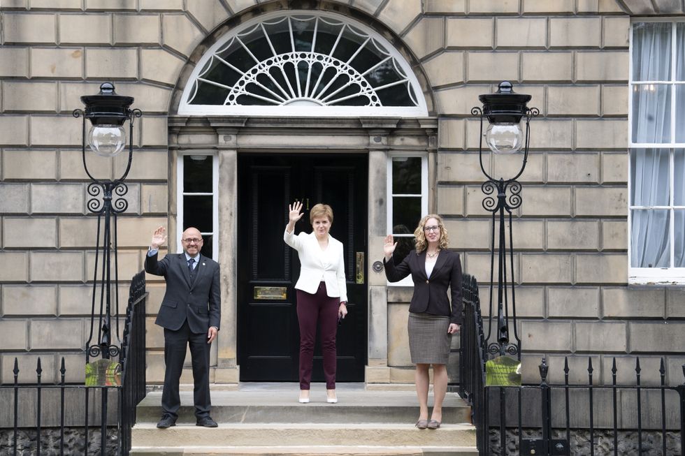 First Minister Nicola Sturgeon (centre) welcomes Scottish Green co-leaders Patrick Harvie and Lorna Slater at Bute House, Charlotte Square, Edinburgh, following their Government Ministerial appointments.