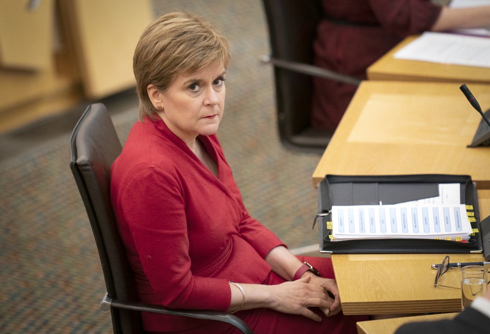 First Minister Nicola Sturgeon during First Minister's Questions in the debating chamber of the Scottish Parliament.