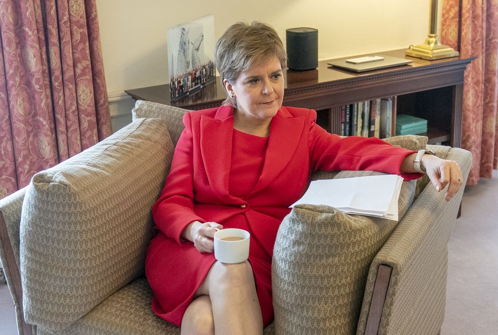 First Minister Nicola Sturgeon has a cup of tea after giving a press conference in Bute House in Edinburgh where she announced that she will stand down as First Minister of Scotland after eight years. Picture date: Wednesday February 15, 2023.