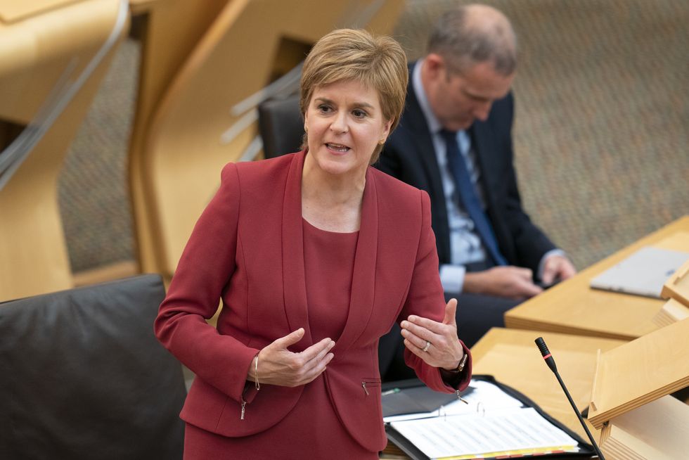 First Minister Nicola Sturgeon in the main chamber of the Scottish Parliament, Edinburgh, delivers a statement on the agreement between the SNP and the Scottish Green Party.