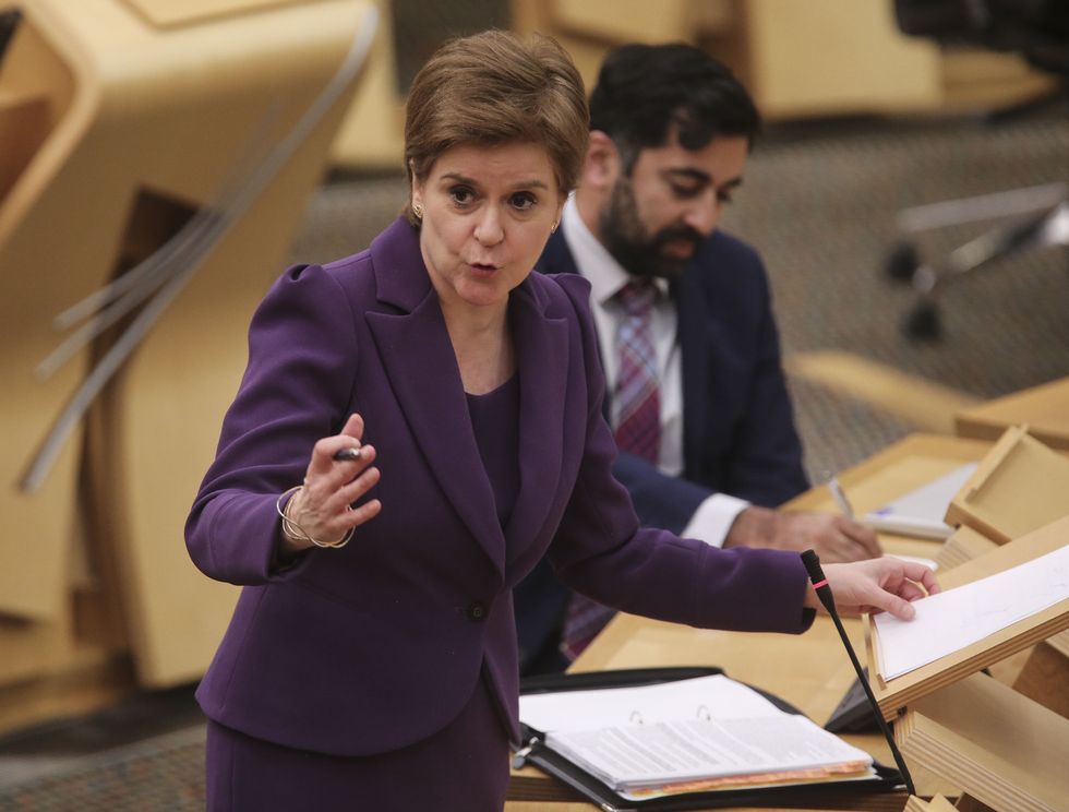 First Minister Nicola Sturgeon updates MSPs on any changes to the Covid-19 restrictions in the debating chamber of the Scottish Parliament in Edinburgh.