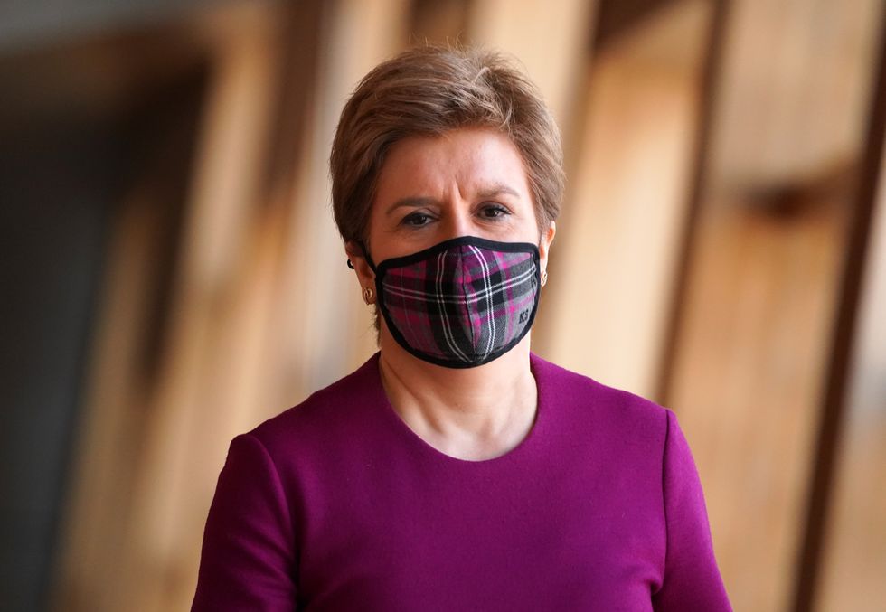 First Minister of Scotland Nicola Sturgeon on her way to First Minister's Questions at the Scottish Parliament in Holyrood, Edinburgh