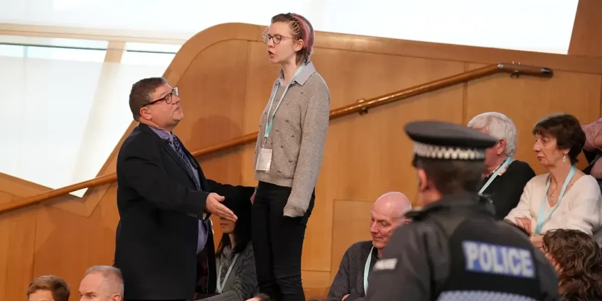 NextImg:Holyrood descends into chaos as protesters disrupt First Minster's Questions SEVEN times