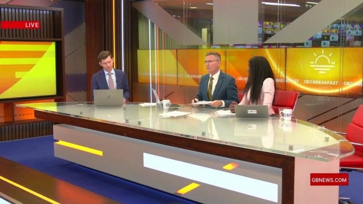 PICTURED: Huge inferno reduces village to ruins as orange flames and billows of smoke soar into Filipino skies