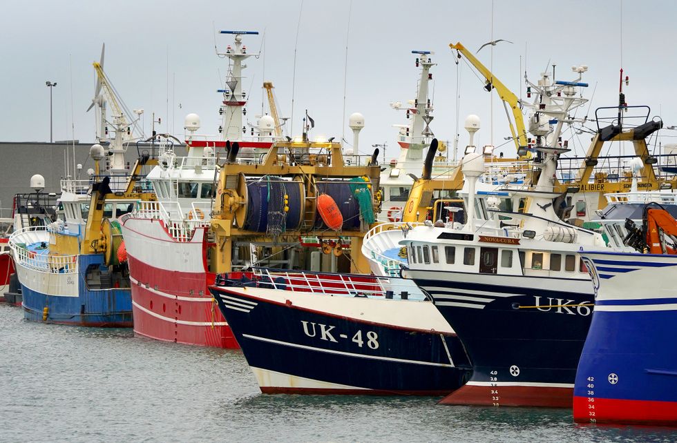 Fishing boats moored in the port of Boulogne, France. Environment Secretary George Eustice has warned France the UK could retaliate if it goes ahead with threats in the fishing row, warning that %22two can play at that game%22. Picture date: Friday October 29, 2021.
