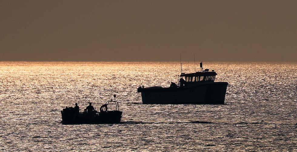 Fishing boats out early in the Channel near Dover, Kent