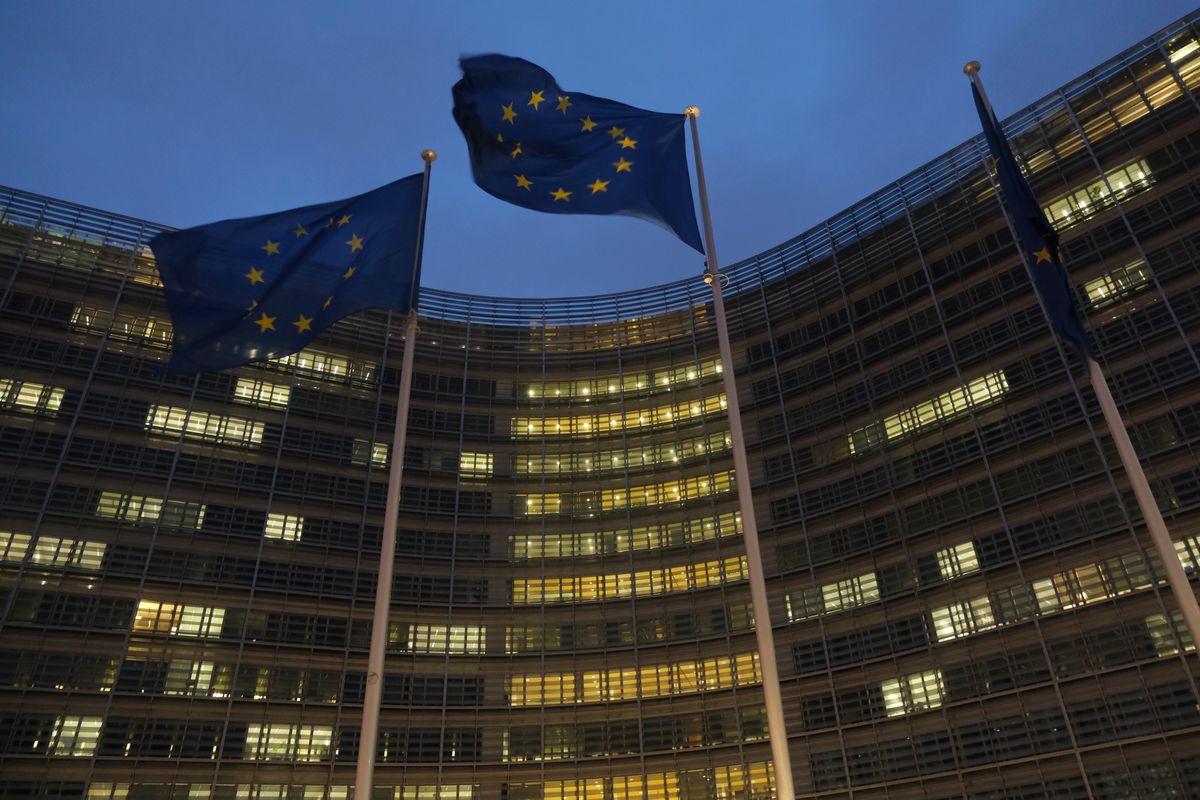 Flags of the European Union fly outside the Berlaymont building of the European Commission