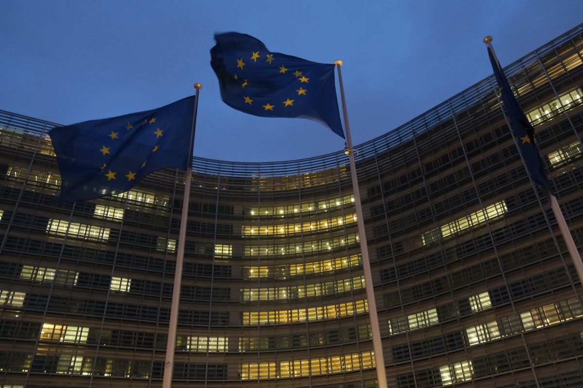 Flags of the European Union fly outside the Berlaymont building of the European Commission